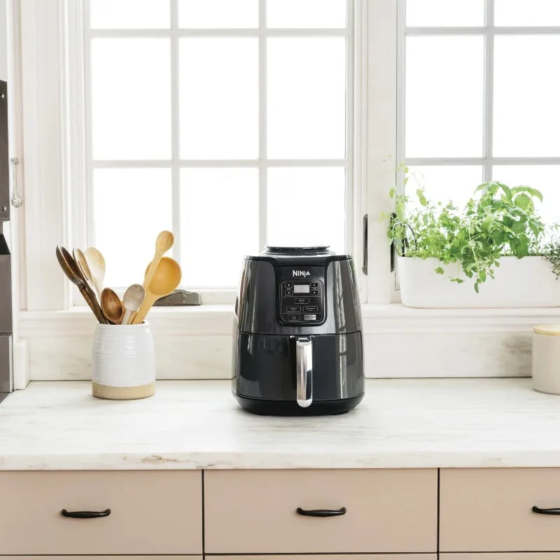 A 3 Strand Cord Ninja Air Fryer Nonstick Basket Plate